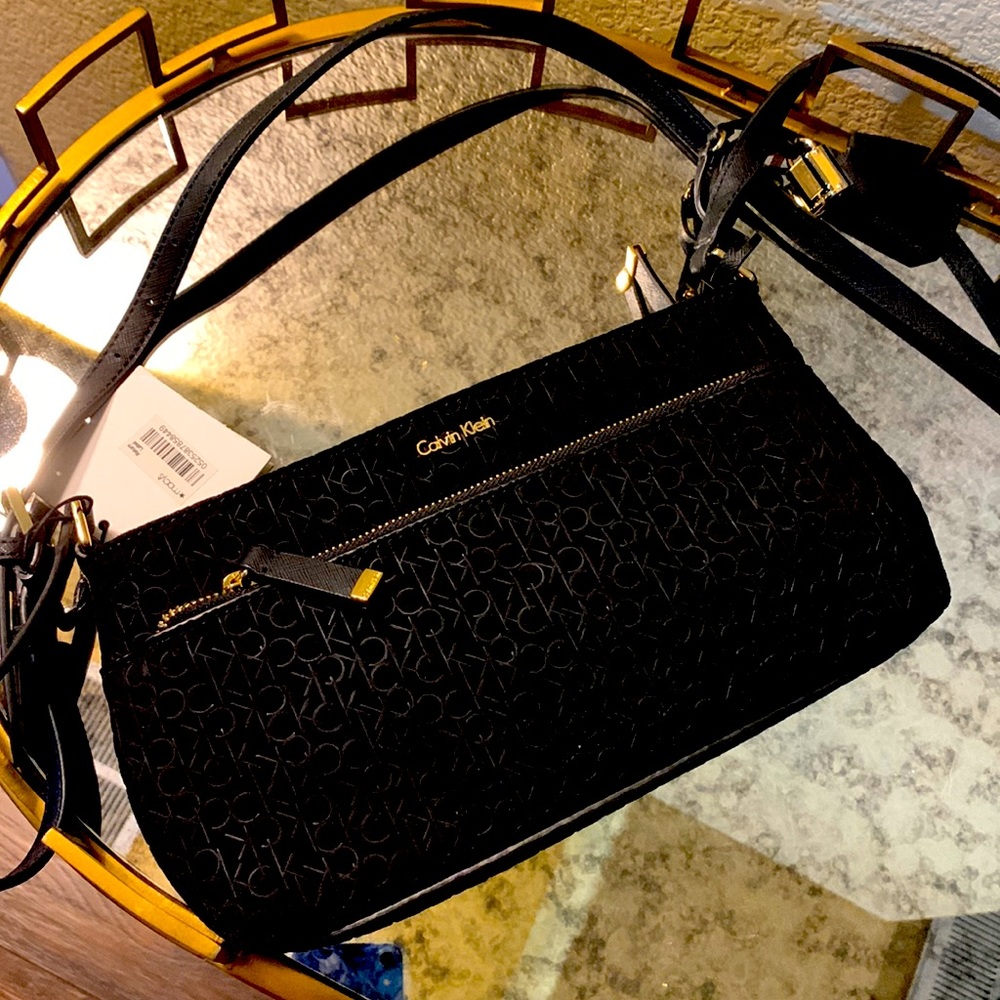 Calvin Clein Crossbody logo embossed purse